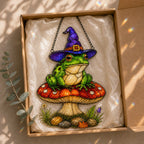 Close-up of the Witch Hat Frog on Red Mushroom holographic suncatcher showing its stained-glass style artwork