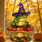 Witch Hat Frog on Red Mushroom holographic acrylic suncatcher styled in a cozy room