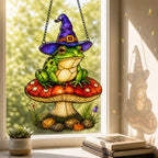 Witch Hat Frog on Red Mushroom holographic acrylic suncatcher in natural daylight