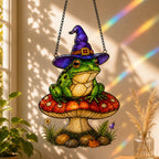 Witch Hat Frog on Red Mushroom suncatcher beside a window with seasonal decor