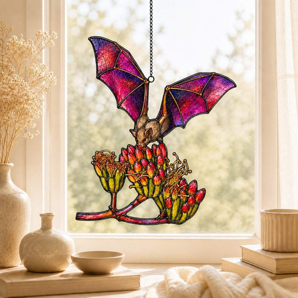 Pink Bat over Autumn Blooms holographic suncatcher with sunlight passing through the acrylic