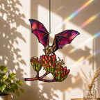 Pink Bat over Autumn Blooms holographic suncatcher hanging in a living room window