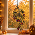 Spider Web with Autumn Berries holographic acrylic suncatcher in natural daylight