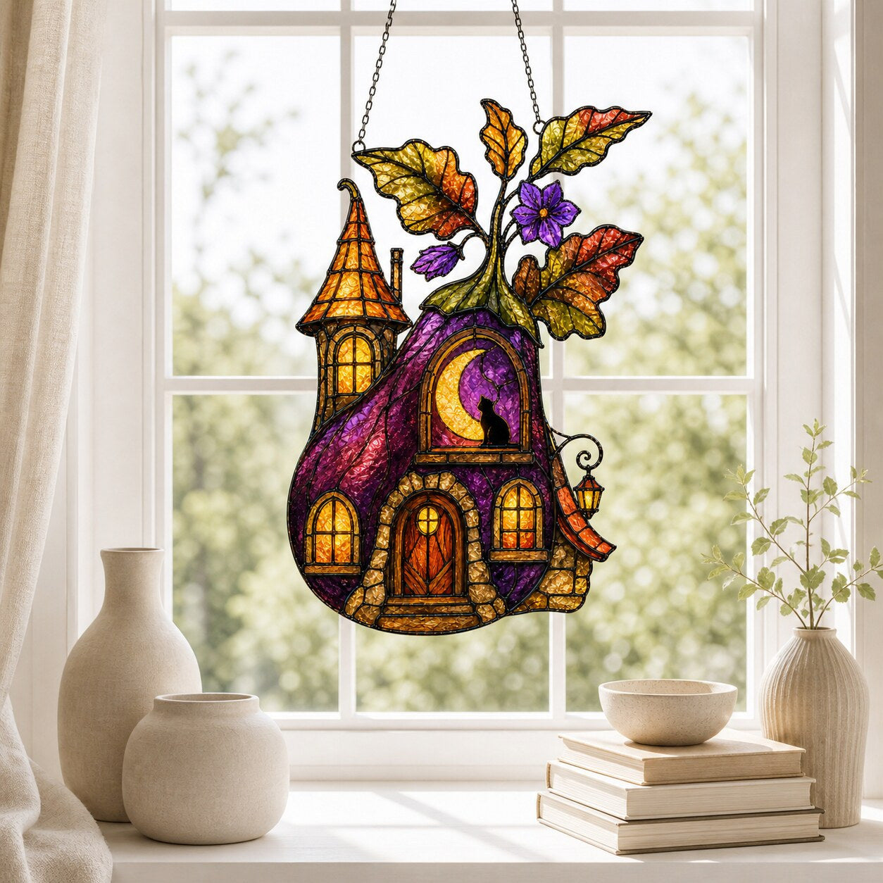Purple Witch Cottage with Crescent Moon holographic suncatcher with sunlight passing through the acrylic