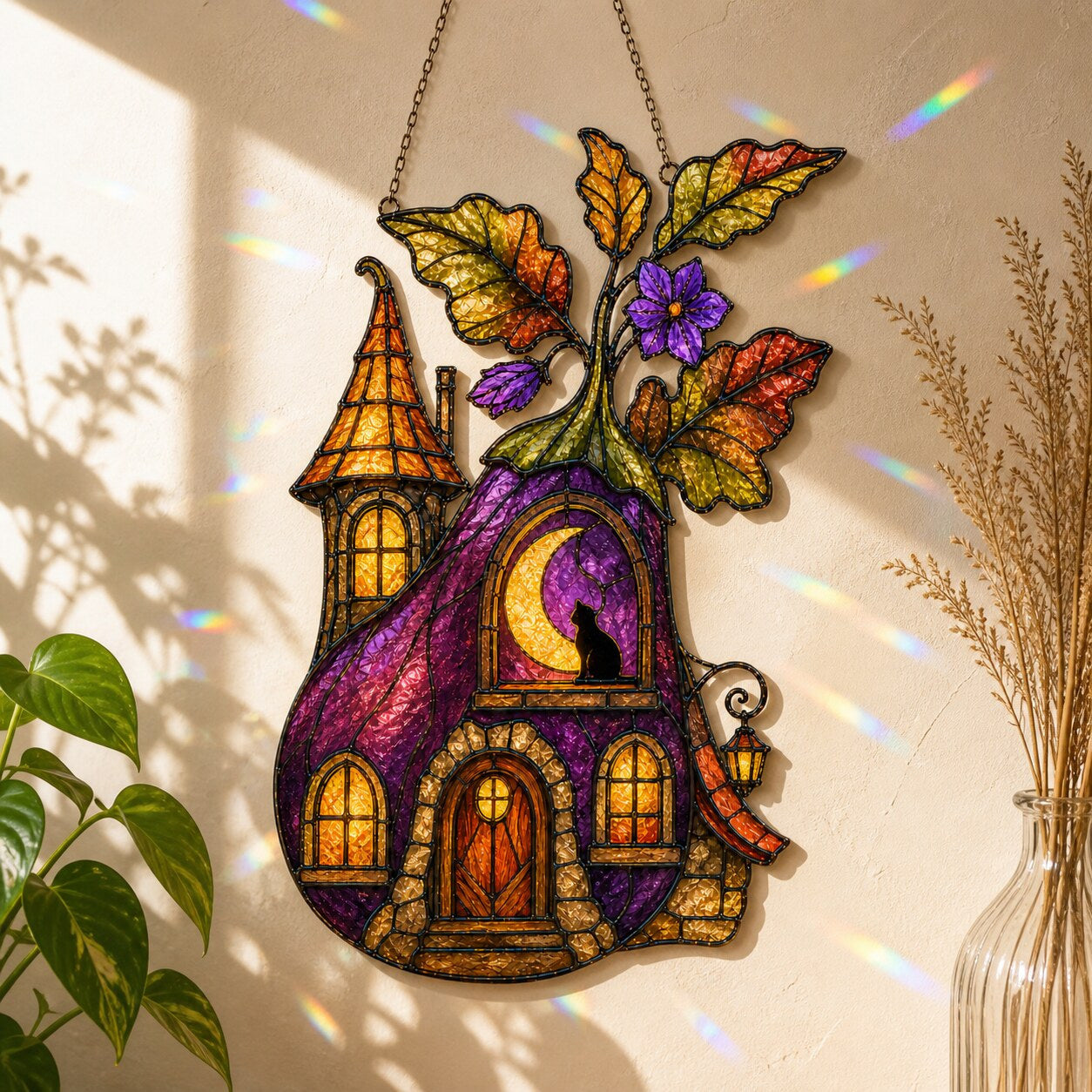 Purple Witch Cottage with Crescent Moon holographic suncatcher hanging in a living room window