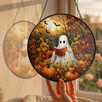 Ghost Reading a Book in a Pumpkin Field Stained Glass Suncatcher