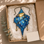 Starry Night Conch Shell suncatcher packaged in a gift box