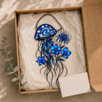 Starry Night Jellyfish suncatcher packaged in a gift box