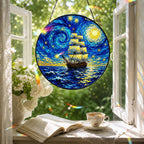 Starry Night tall ship suncatcher in a reading nook window