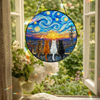 Four cats suncatcher hanging in an open window