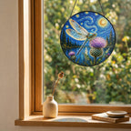 Dragonfly suncatcher on a windowsill