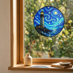 Lighthouse suncatcher on a windowsill