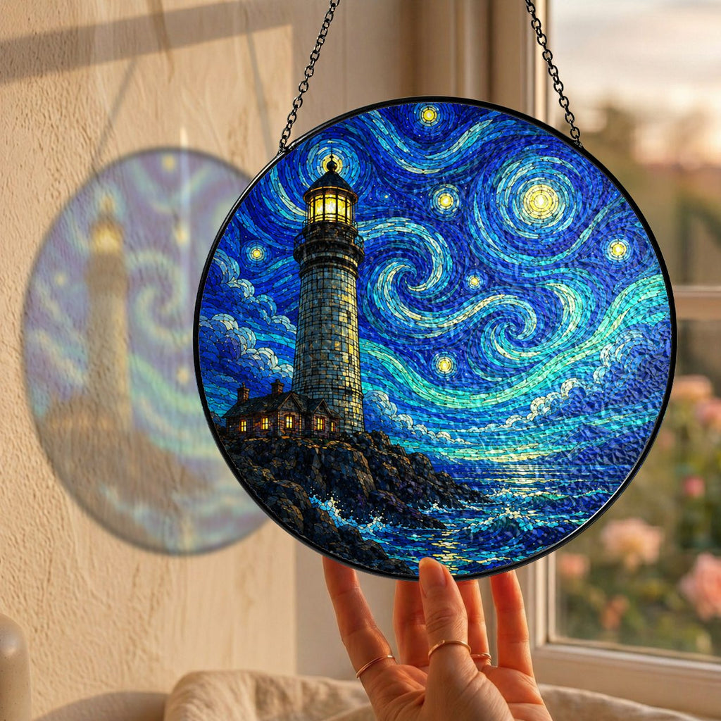 Hand holding the lighthouse suncatcher at a window