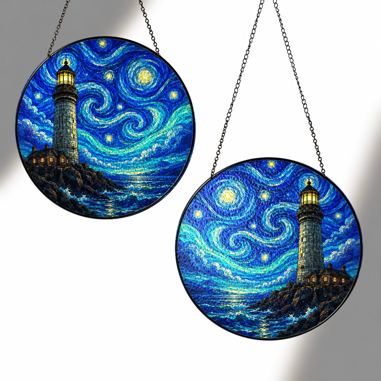 Two sizes of the lighthouse suncatcher side by side