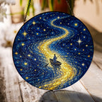 River of stars rowboat suncatcher on a wooden table in sunlight