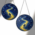 Two sizes of the rowboat suncatcher side by side