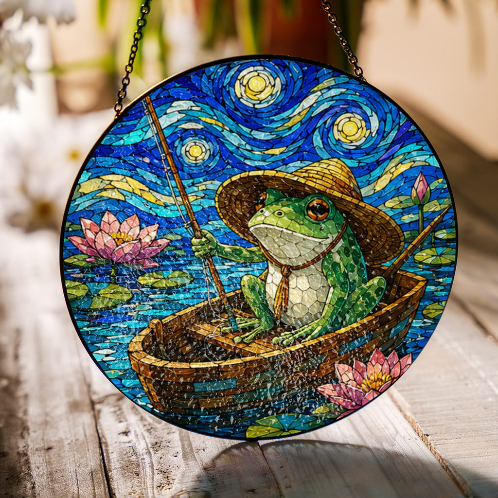 Fishing frog suncatcher on a wooden table in sunlight
