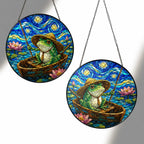 Two sizes of the fishing frog suncatcher side by side