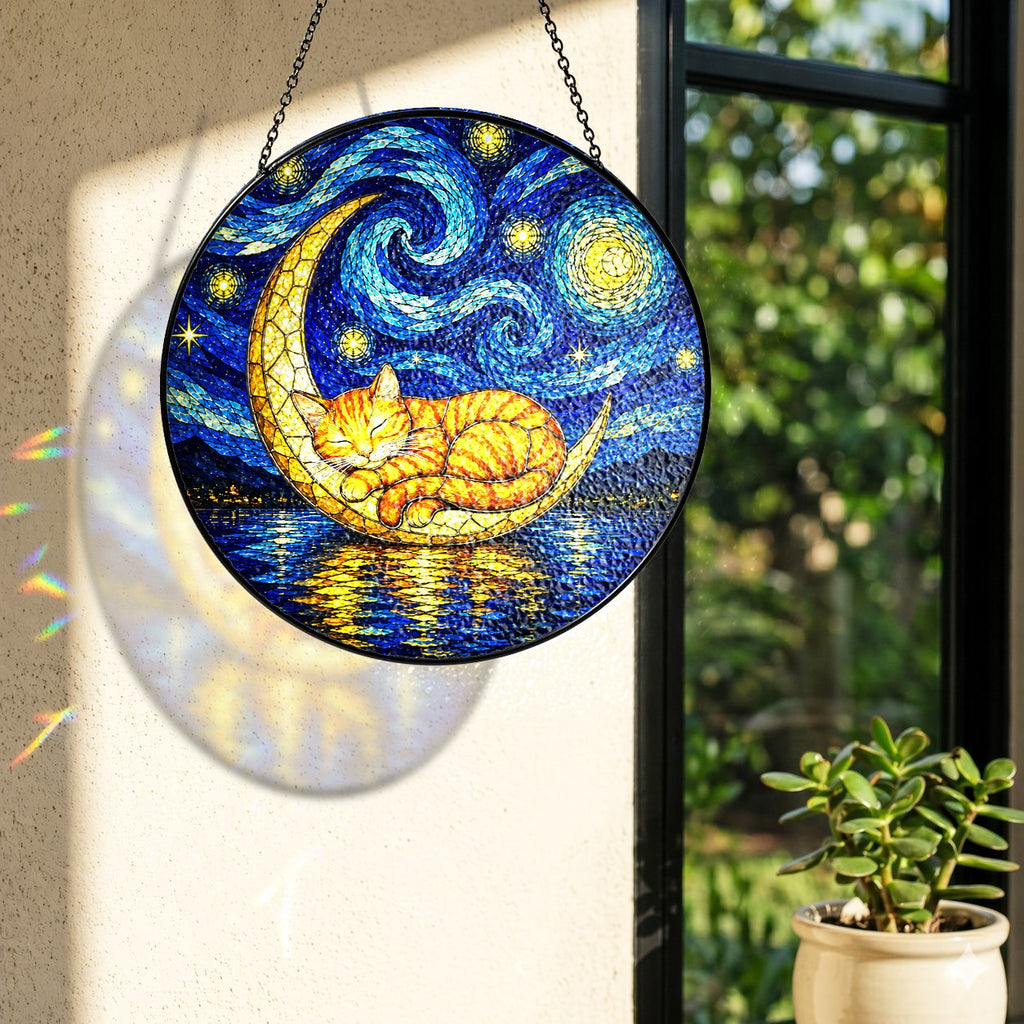 Rainbow light cast by the cat moon stained glass suncatcher