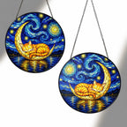 Two sizes of the cat moon suncatcher side by side