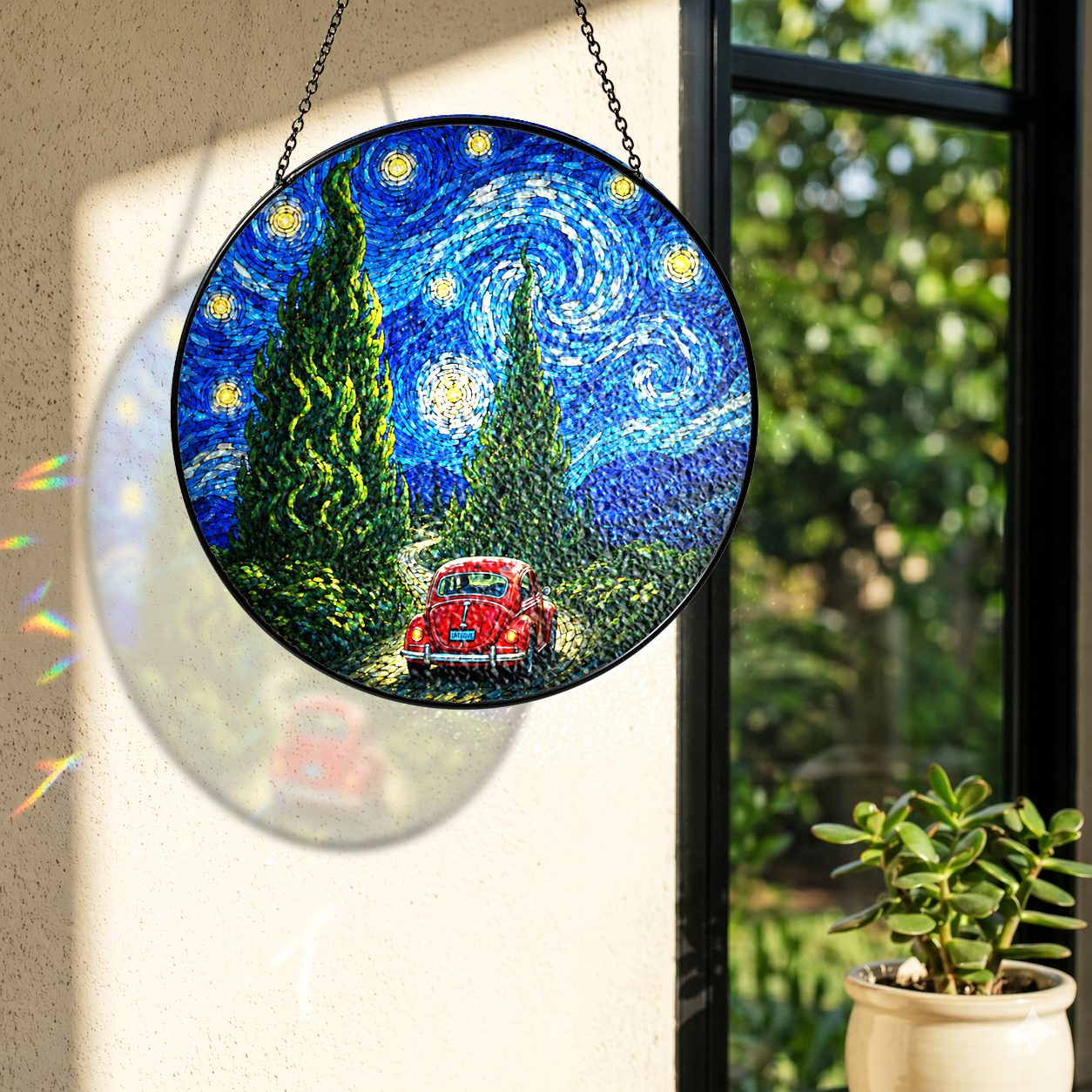 Rainbow light cast by the red car stained glass suncatcher
