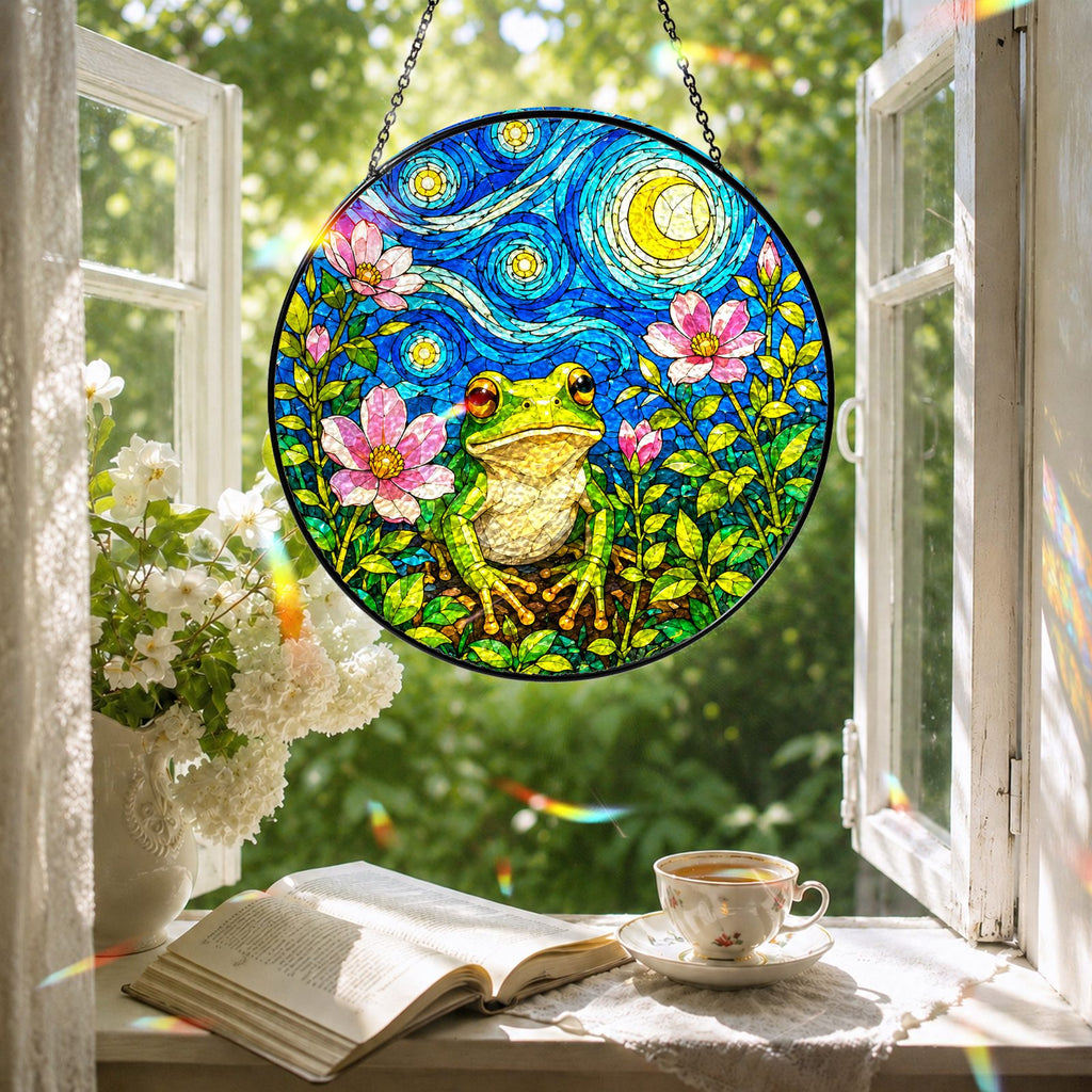 Frog blossom suncatcher in a reading nook window