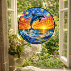 Dolphin suncatcher hanging in an open window