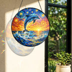 Rainbow light cast by the dolphin stained glass suncatcher