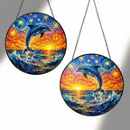 Two sizes of the dolphin suncatcher side by side