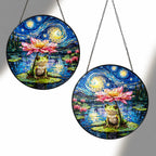 Two sizes of the frog lotus suncatcher side by side
