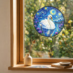 Swan suncatcher on a windowsill