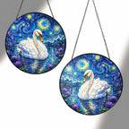 Two sizes of the swan suncatcher side by side