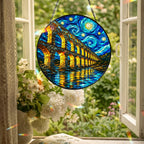 Aqueduct suncatcher hanging in an open window