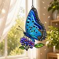 Blue butterfly and purple lilac cluster holographic acrylic suncatcher in a sunlit window