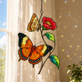 Orange butterflies red blossom suncatcher with rainbow sparkles