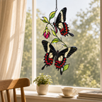 Black swallowtail butterflies fuchsia suncatcher in a dining window