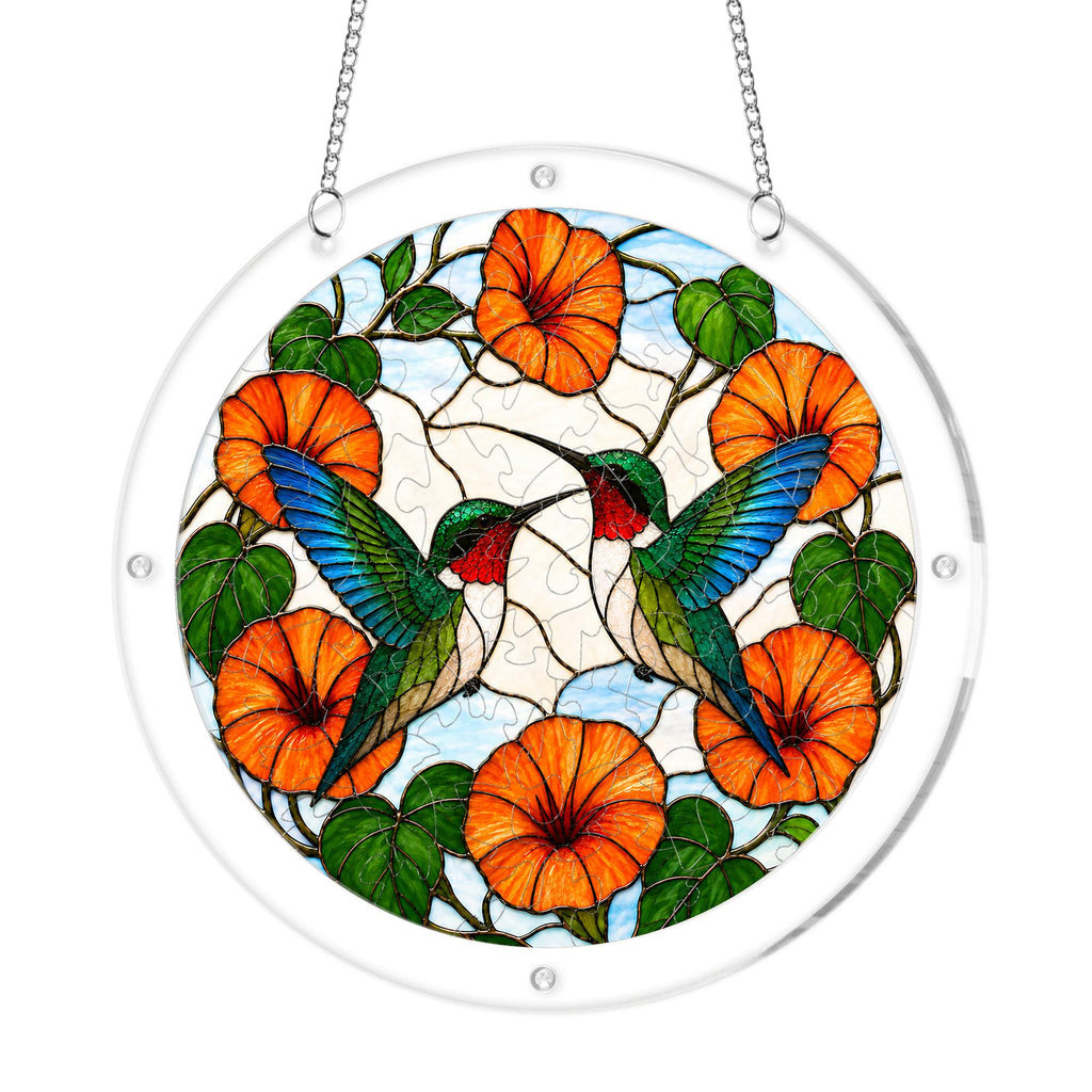Round two hummingbirds orange flower acrylic puzzle suncatcher on white background with clear frame and hanging chain