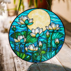 White lotus stained glass suncatcher in a bright window with soft daylight