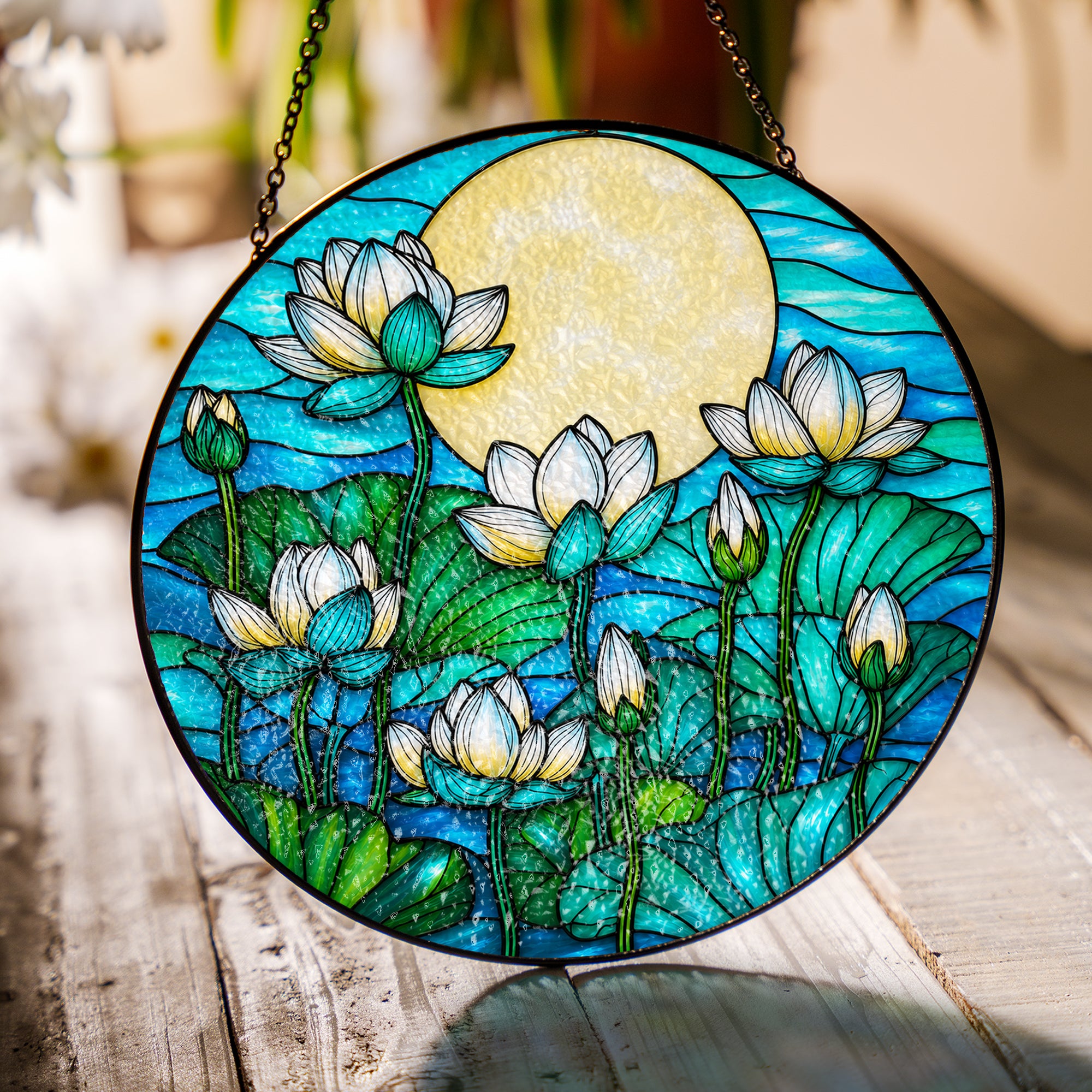 White lotus stained glass suncatcher in a bright window with soft daylight