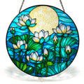 White lotus stained glass suncatcher with full moon and black frame on a white background